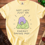 Yellow t-shirt with "Not Lazy Just on Energy Saving Mode" graphic of sleepy character.
