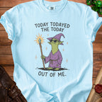 Light blue t-shirt with green goblin graphic and text "Today todayed the today out of me."