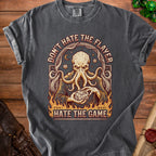 Gray t-shirt with "Don't Hate the Flayer, Hate the Game" text and octopus illustration.