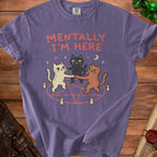 Purple t-shirt with three cats dancing in a pentagram with candles and stars.