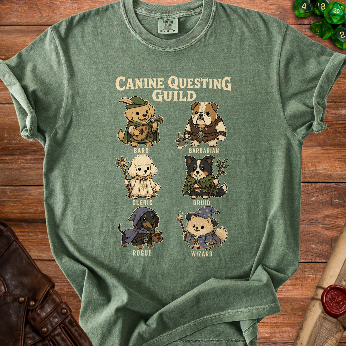 Green t-shirt featuring six dogs dressed as Dungeons & Dragons characters under "Canine Questing Guild".