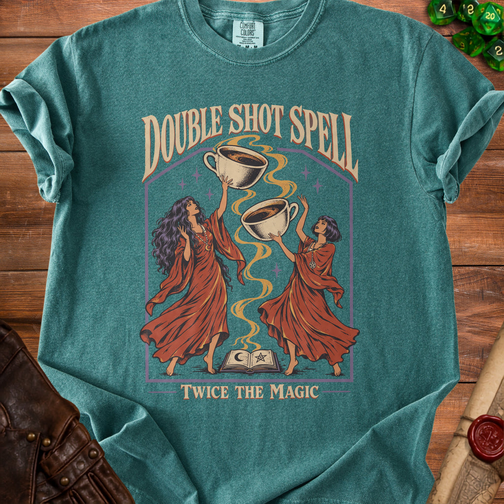 Green t-shirt with "Double Shot Spell" and "Twice The Magic" text and witch graphic.