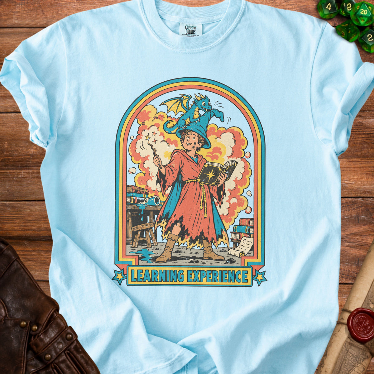 Cartoon wizard with a dragon on his hat and the words "Learning Experience".