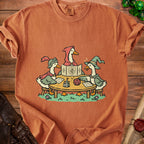 Three geese play a tabletop roleplaying game with dice, a castle, and rulebooks.