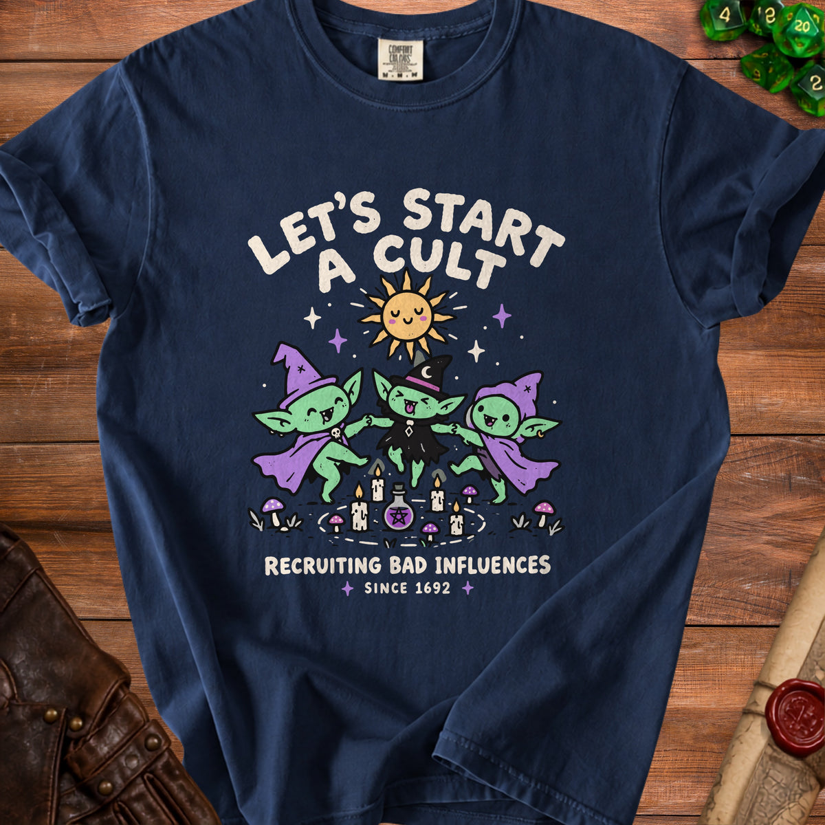 Dark blue t-shirt with "Let's Start a Cult" text and cartoon goblins.