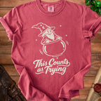 T-shirt with a wizard in a cauldron and text "This Counts as Trying".