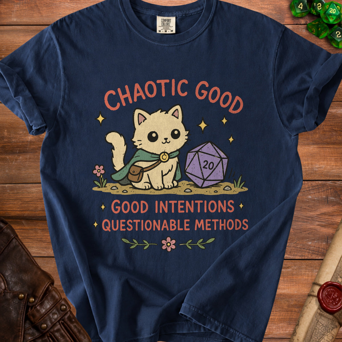 Navy t-shirt with a cat wearing a cape next to a D20 die, reading "Chaotic Good".