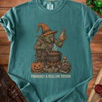 Goblin brewing potion with cauldron, pumpkin, and spell book. "PROBABLY A HEALING POTION" text.