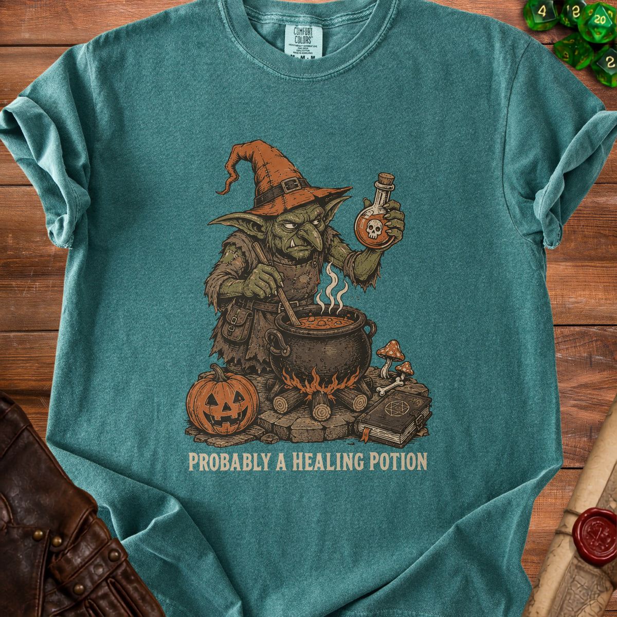 Goblin brewing potion with cauldron, pumpkin, and spell book. "PROBABLY A HEALING POTION" text.