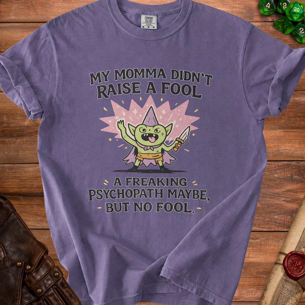 Purple t-shirt with a goblin graphic and text "My Momma Didn't Raise a Fool".