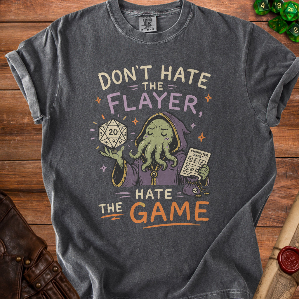 Don't Hate the Flayer, Hate the Game graphic tee with a D20 and character sheet.