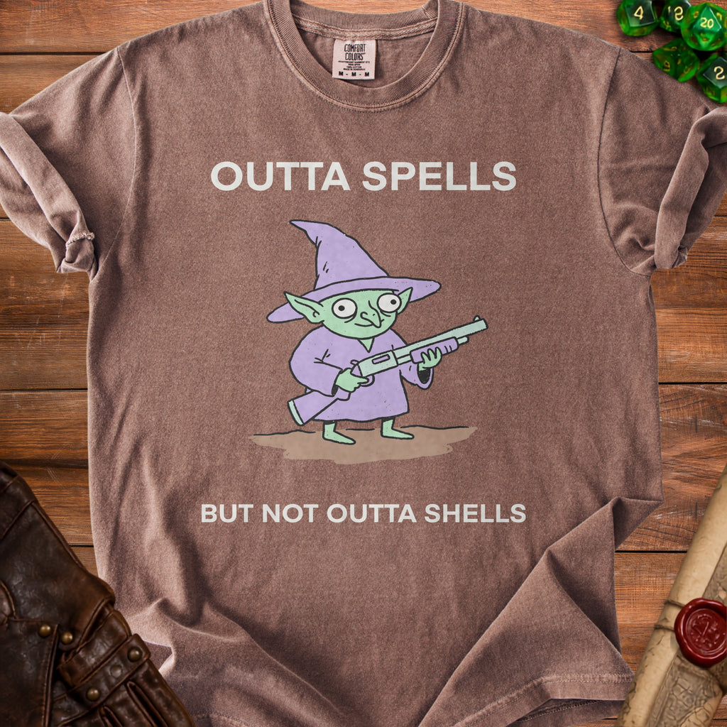 T-shirt with a cartoon goblin holding a shotgun, saying "Outta Spells But Not Outta Shells".