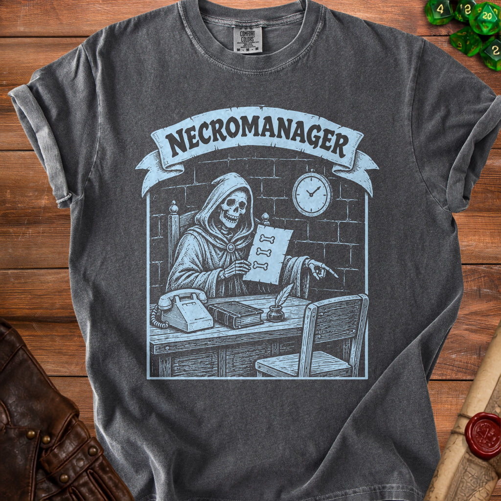 Dark grey t-shirt with a light blue graphic of a skeleton "NECROMANAGER" at a desk.