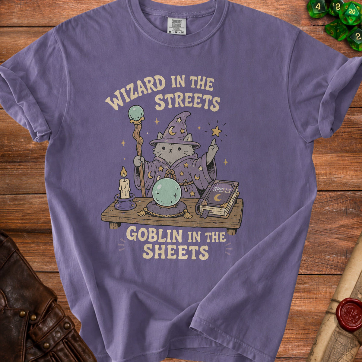 Purple t-shirt with text "Wizard in the streets Goblin in the sheets" and a cat wizard graphic.