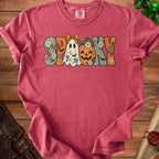 Pink Comfort Colors t-shirt with "Spooky" graphic featuring ghost, pumpkin, and flowers.