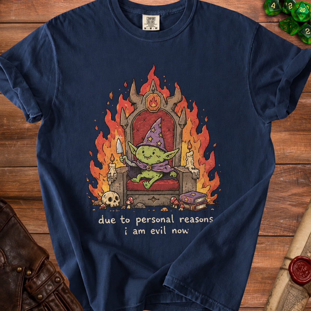 Dark blue t-shirt with a graphic of a goblin on a throne, surrounded by flames, and text.