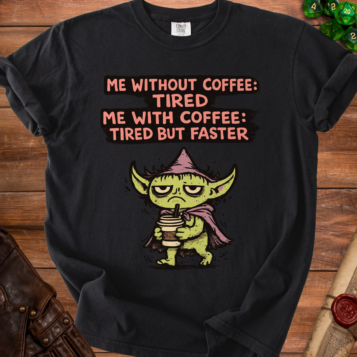 T-shirt with text "Me Without Coffee: Tired, Me With Coffee: Tired But Faster" and cartoon character.