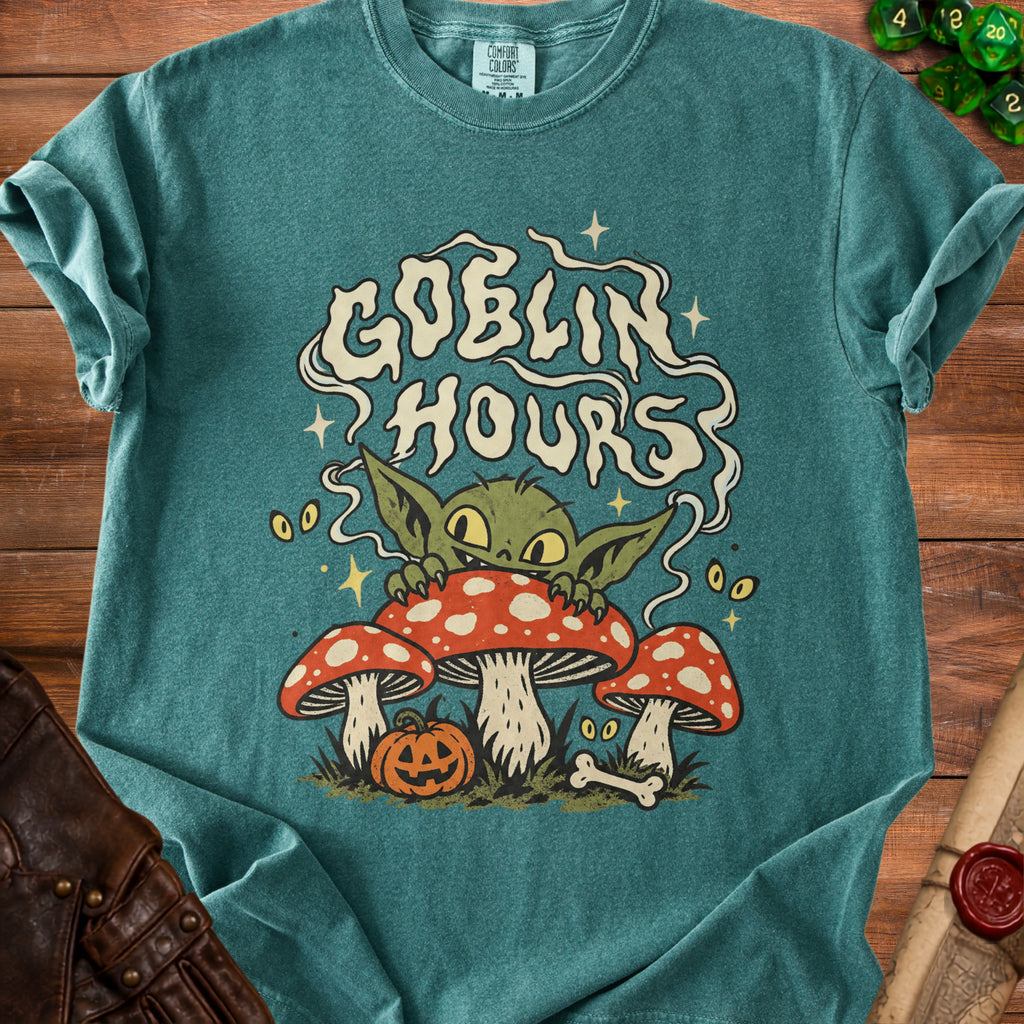 Goblin Hours text with a goblin peeking over mushrooms and a jack-o'-lantern.
