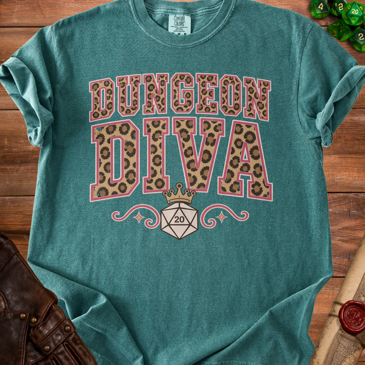 Teal t-shirt with "Dungeon Diva" text and a D20 die graphic.