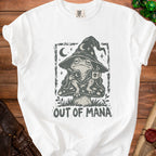 White t-shirt with a frog in a wizard hat, holding a book and mug, reading "OUT OF MANA".