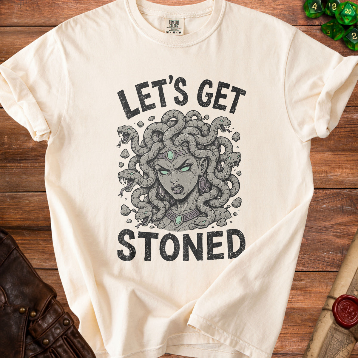 Cream t-shirt with Medusa graphic and text "LET'S GET STONED".