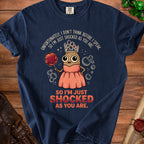 Navy t-shirt with a cartoon potato wearing a crown and dress saying "SO I'M JUST SHOCKED AS YOU ARE."