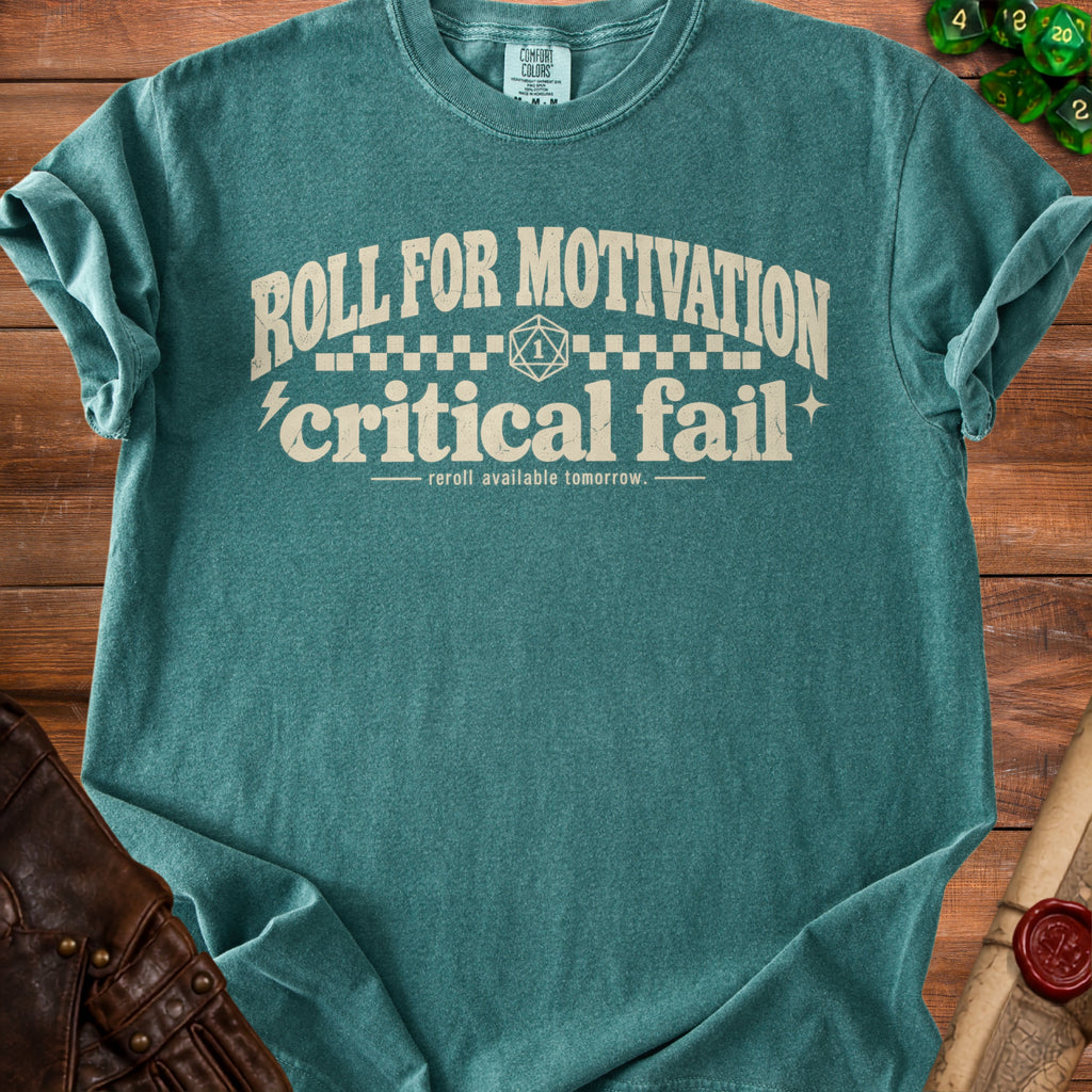 Teal t-shirt with "Roll for motivation, critical fail" text and dice.