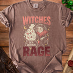 Brown t-shirt with "Witches of a Certain Rage" graphic and a cartoon witch.