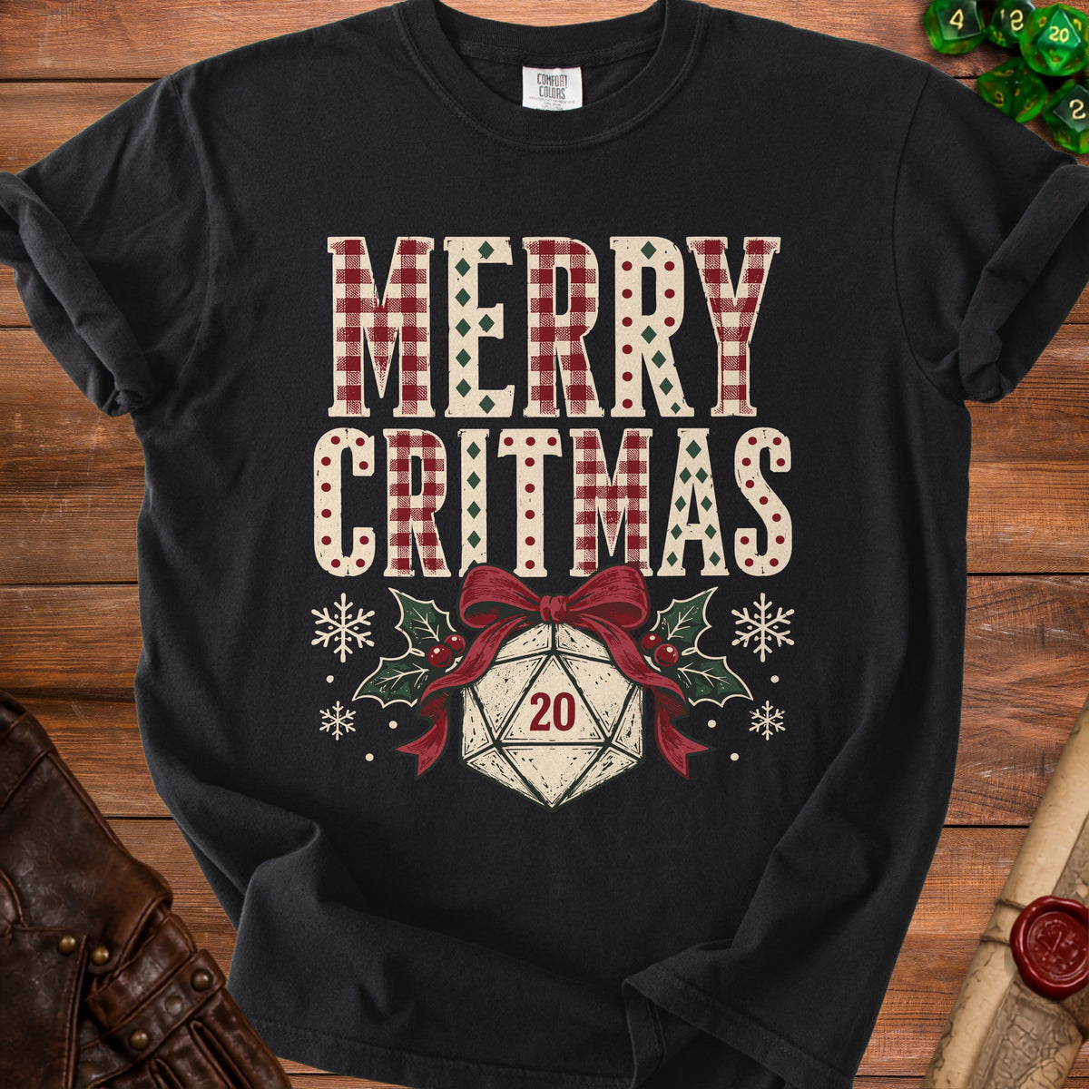Black t-shirt with "Merry Critmas" text and a d20 die.