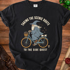 Wizard riding bicycle with basket, text reads "Taking the scenic route to the side quest".