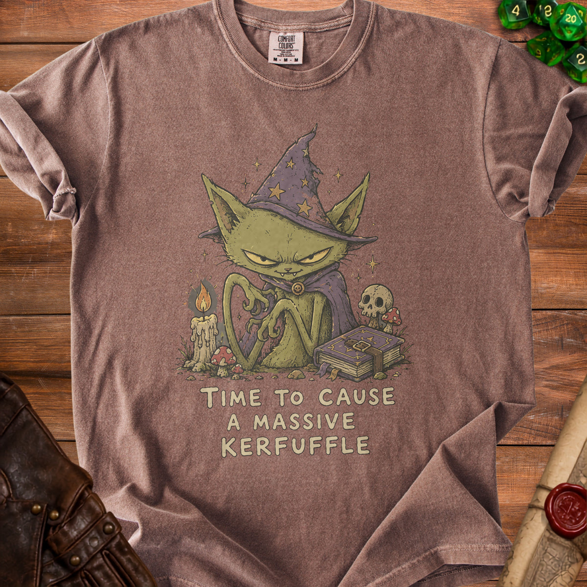 Brown t-shirt with graphic of a green cat wizard and text "TIME TO CAUSE A MASSIVE KERFUFFLE".