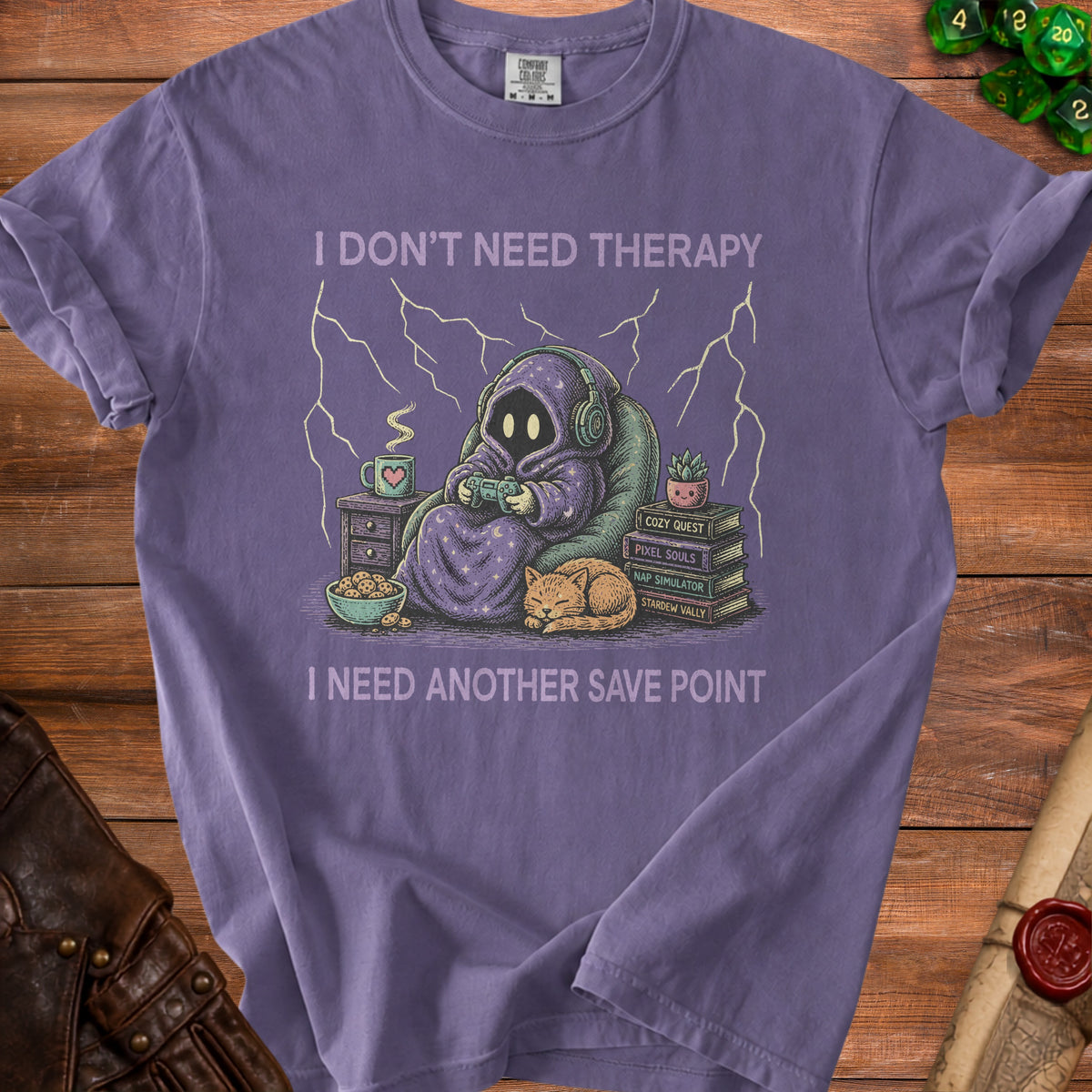 Purple t-shirt graphic with text "I DON'T NEED THERAPY I NEED ANOTHER SAVE POINT".