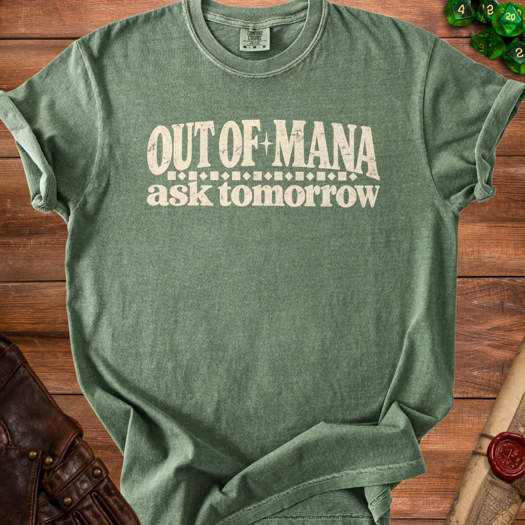 Green t-shirt with "OUT OF MANA ask tomorrow" text.