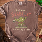 Brown t-shirt with "I Cherish Stability The Ability to Stab" and a goblin holding a dagger.
