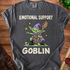 T-shirt with "Emotional Support Goblin" text and cartoon goblin character holding a flower and spoon.