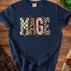 Navy blue t-shirt with "MAGE" text in patterned letters and stars.