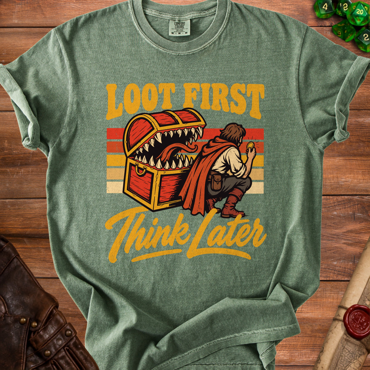 Green t-shirt with "Loot First Think Later" text and a monster chest with adventurer.
