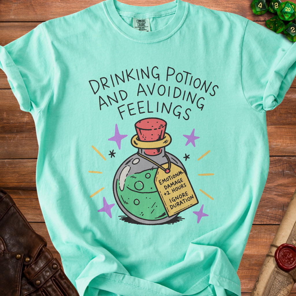 Teal t-shirt with "Drinking Potions and Avoiding Feelings" text and potion bottle graphic.