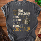 Dark grey t-shirt with "The Prophecy Was Vague But I Took It Personally" text.