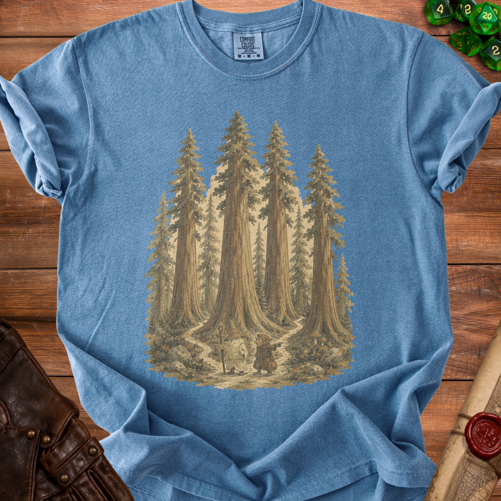 Blue t-shirt with graphic of wizard and goblin in a redwood forest.