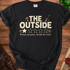 Black t-shirt with "The Outside" text, stars, and dice graphics.