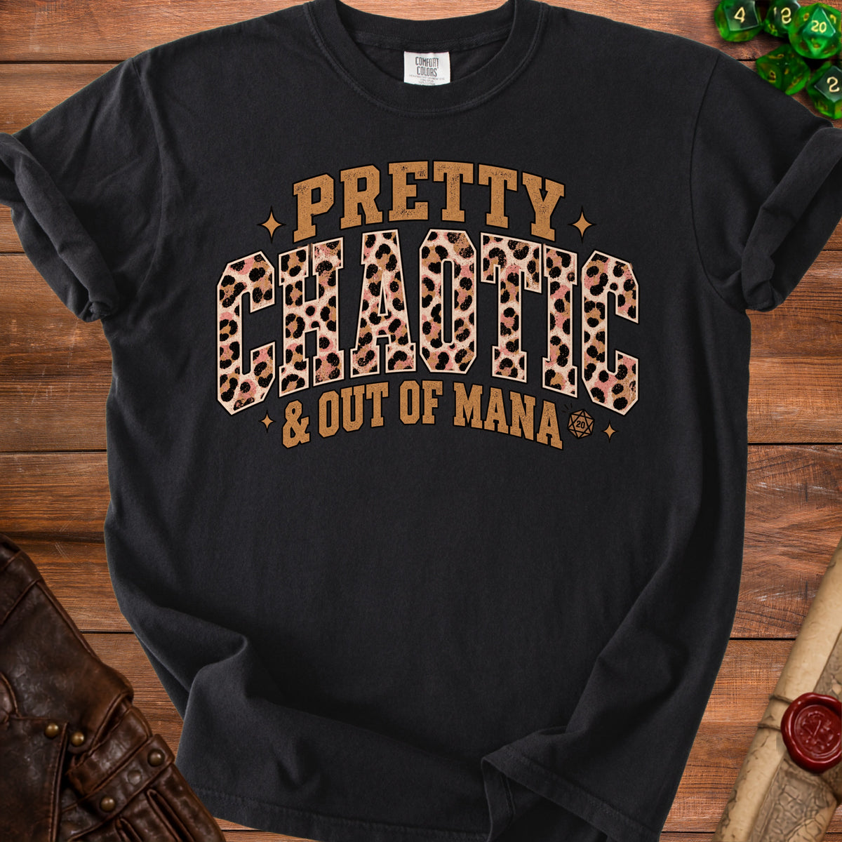Black t-shirt with "Pretty Chaotic & Out of Mana" text and leopard print.