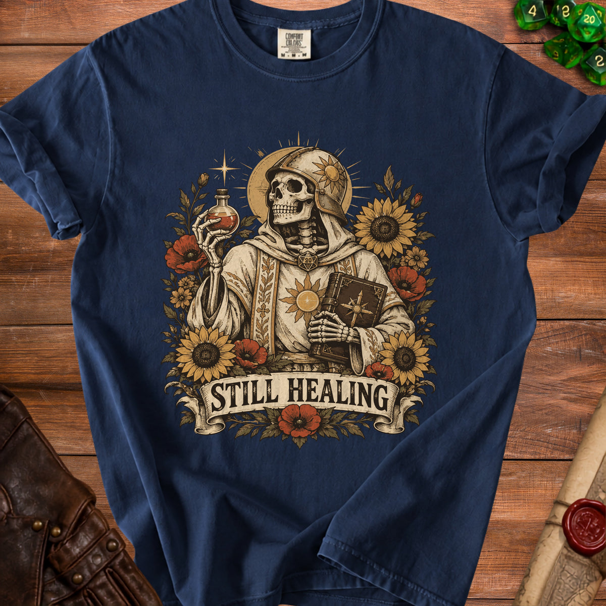 Skeleton in armor holding potion and book, with sunflowers and poppies, text "STILL HEALING".