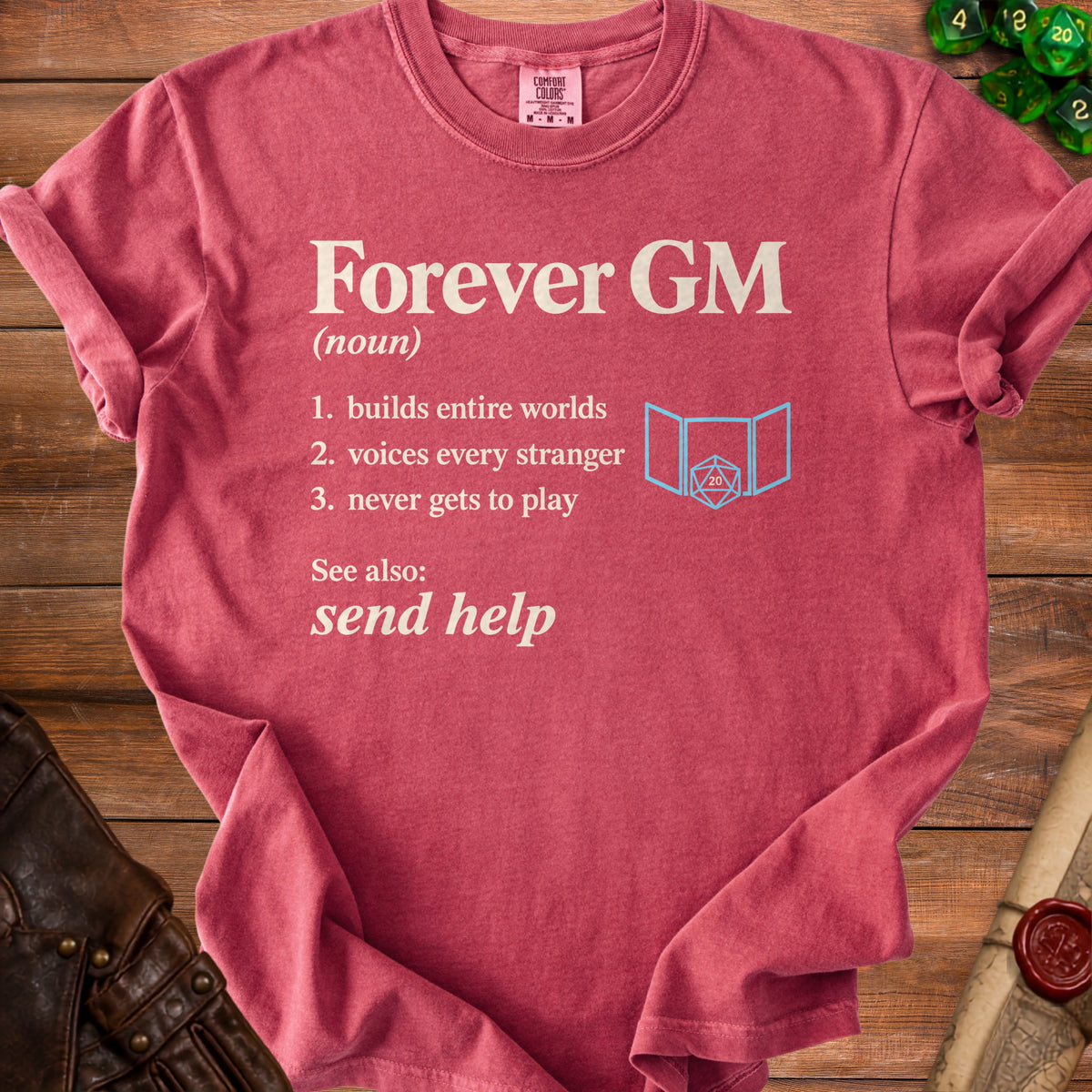 Pink t-shirt with "Forever GM" definition and dice graphic.