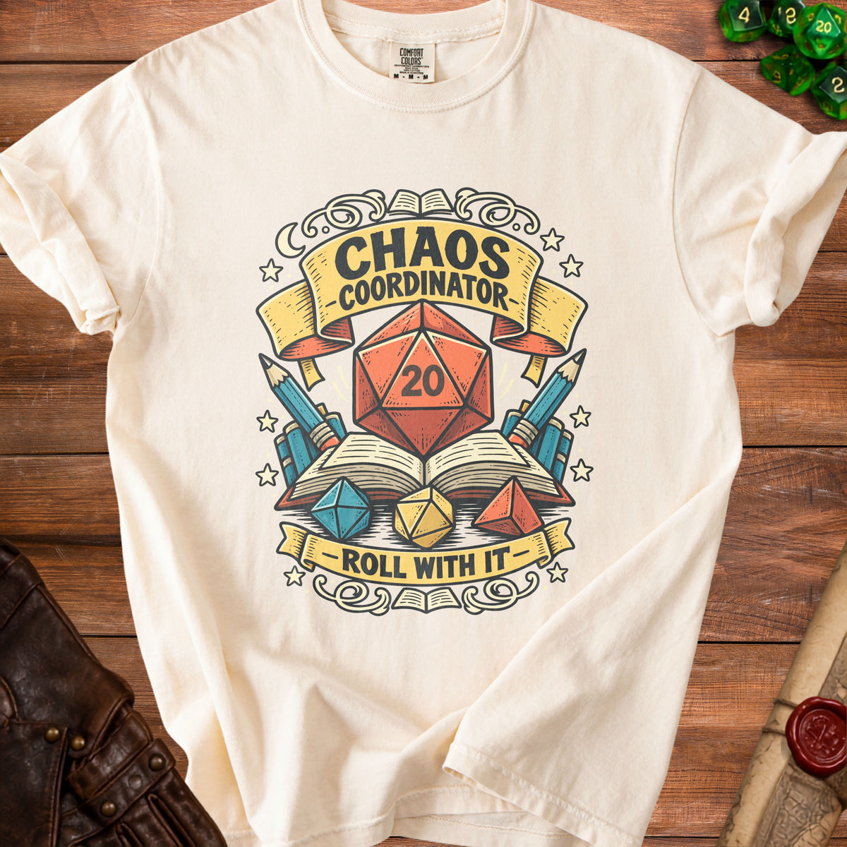 Cream t-shirt with "Chaos Coordinator Roll With It" and D20 dice design.