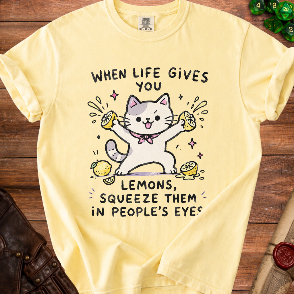 Yellow t-shirt with a cat holding lemons and text "When life gives you lemons, squeeze them in people's eyes".