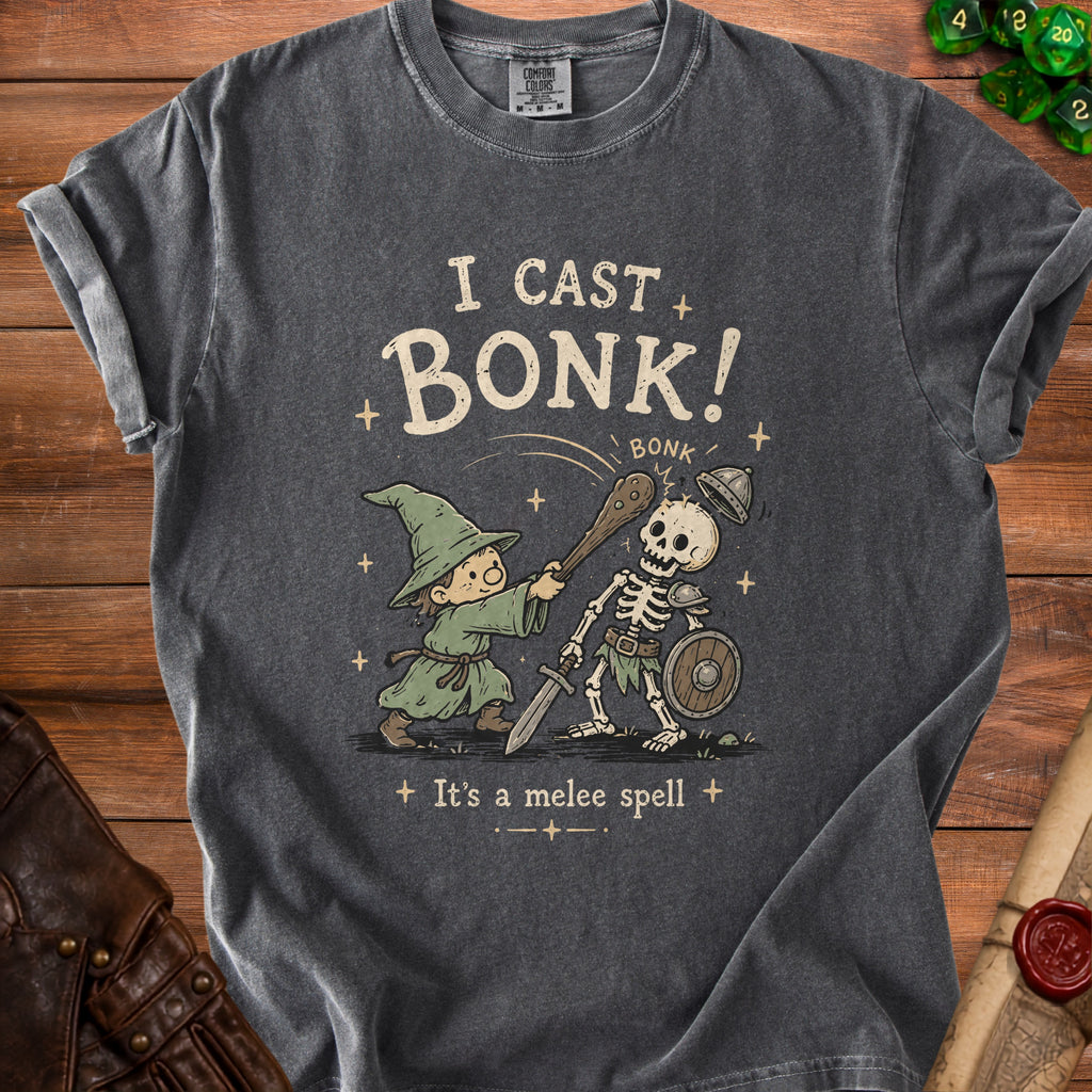 Grey t-shirt with a wizard casting "BONK!" on a skeleton.