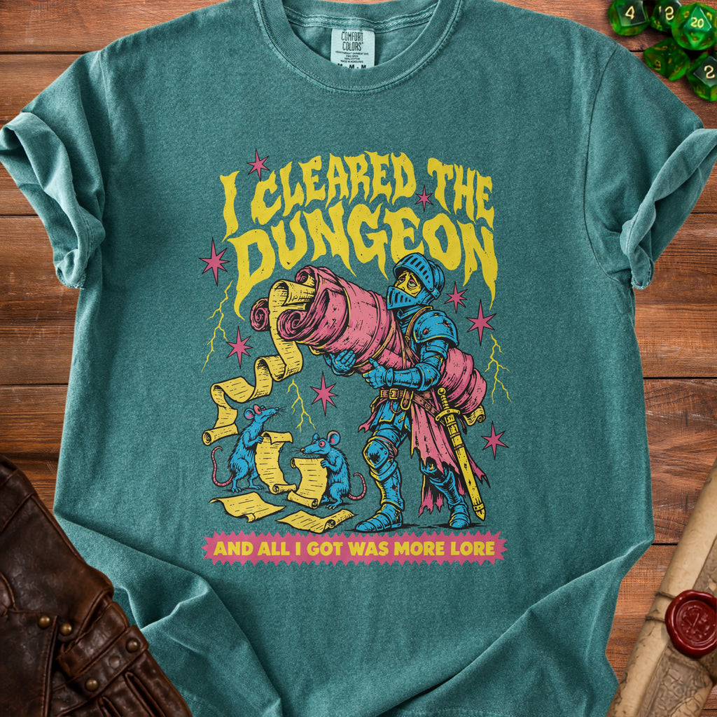 T-shirt with knight, mice, scrolls, and text "I CLEARED THE DUNGEON AND ALL I GOT WAS MORE LORE".