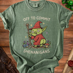Green t-shirt with a cartoon goblin holding a staff and text "OFF TO COMMIT SHENANIGANS".