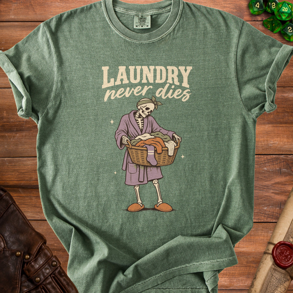 Green t-shirt with skeleton in robe carrying laundry basket and text "Laundry never dies".